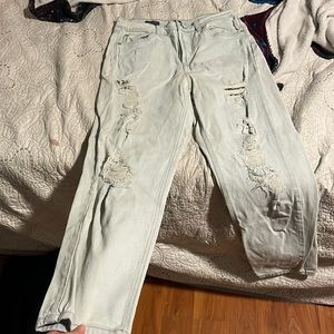 Light blue washed out ripped denim jeans